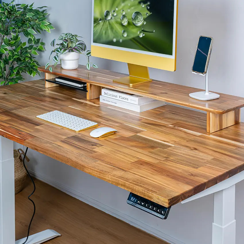 Omnidesk Pro Acacia Light sit-stand desk natural wood interior setup