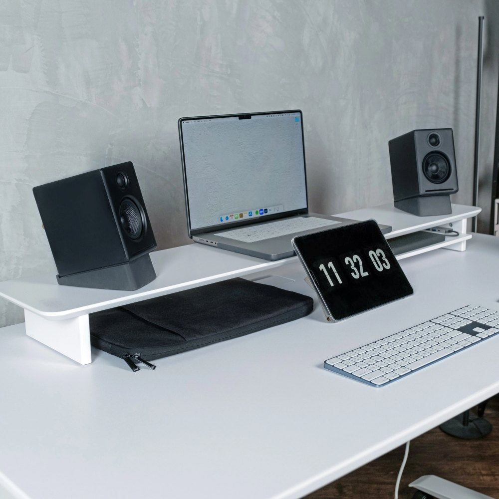 Omnidesk Arka desk riser white MDF on desk with monitor and organised workspace setup